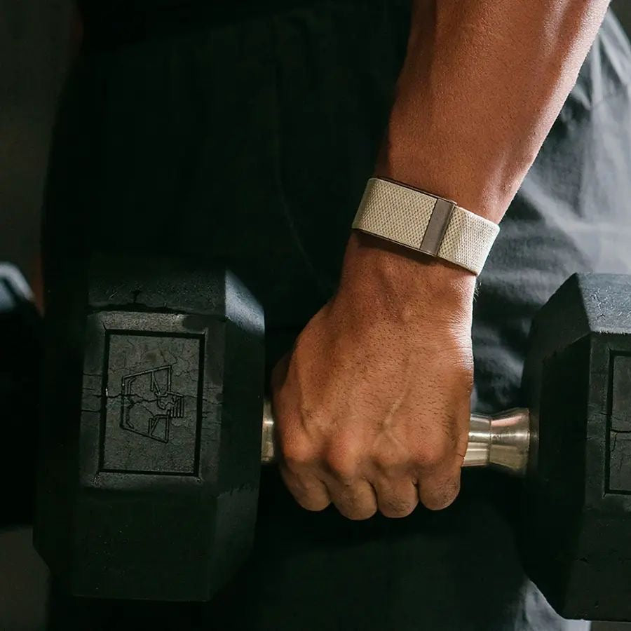 Fitness band worn during a dumbbell workout